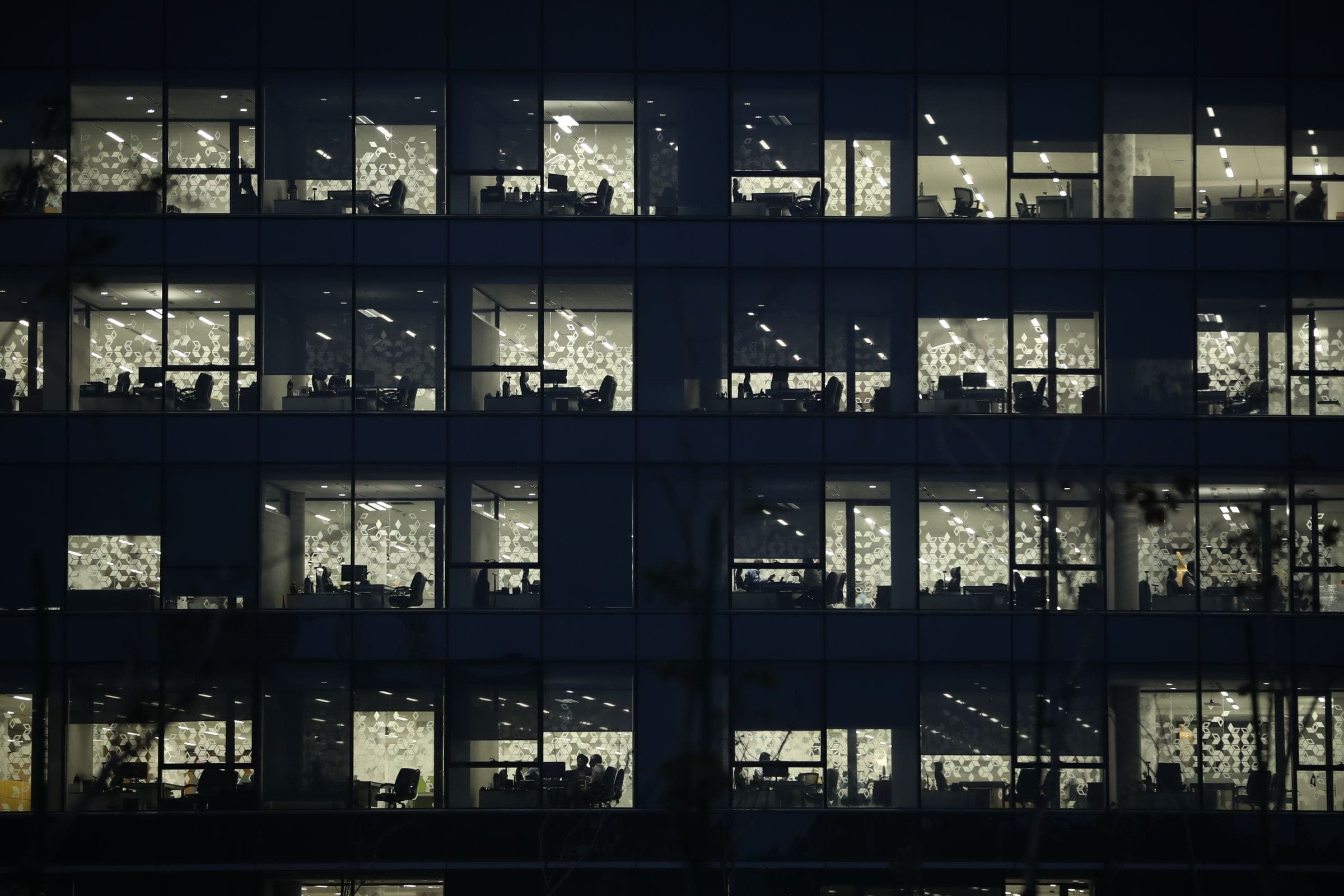 Office tower lit at night