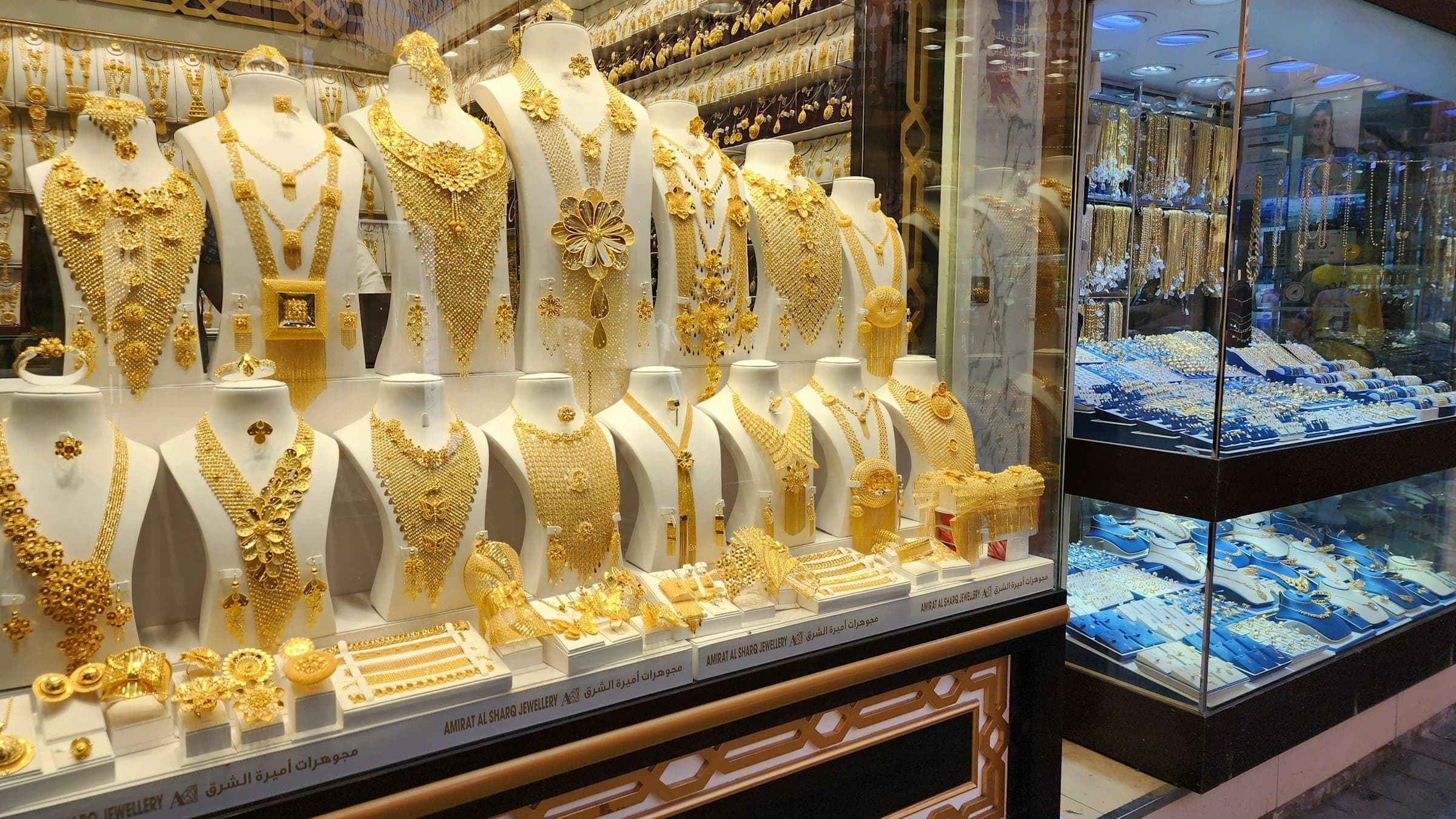 Illuminated display of gold jewellery